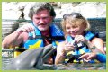 Goldie Hawn Rocks a Red Swimsuit at Age 67, Feeds Dolphins With Kurt Russell
